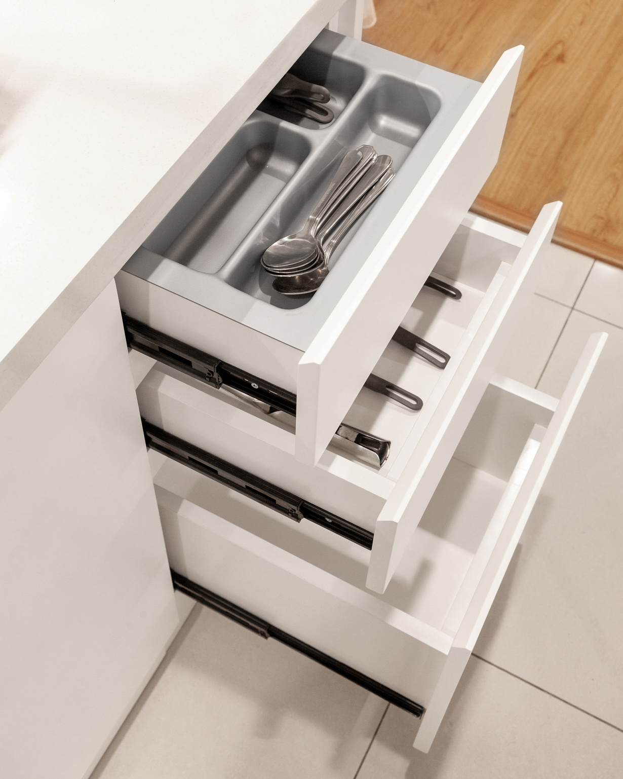 Gray Utensils Organizer Inside the Kitchen Drawer 